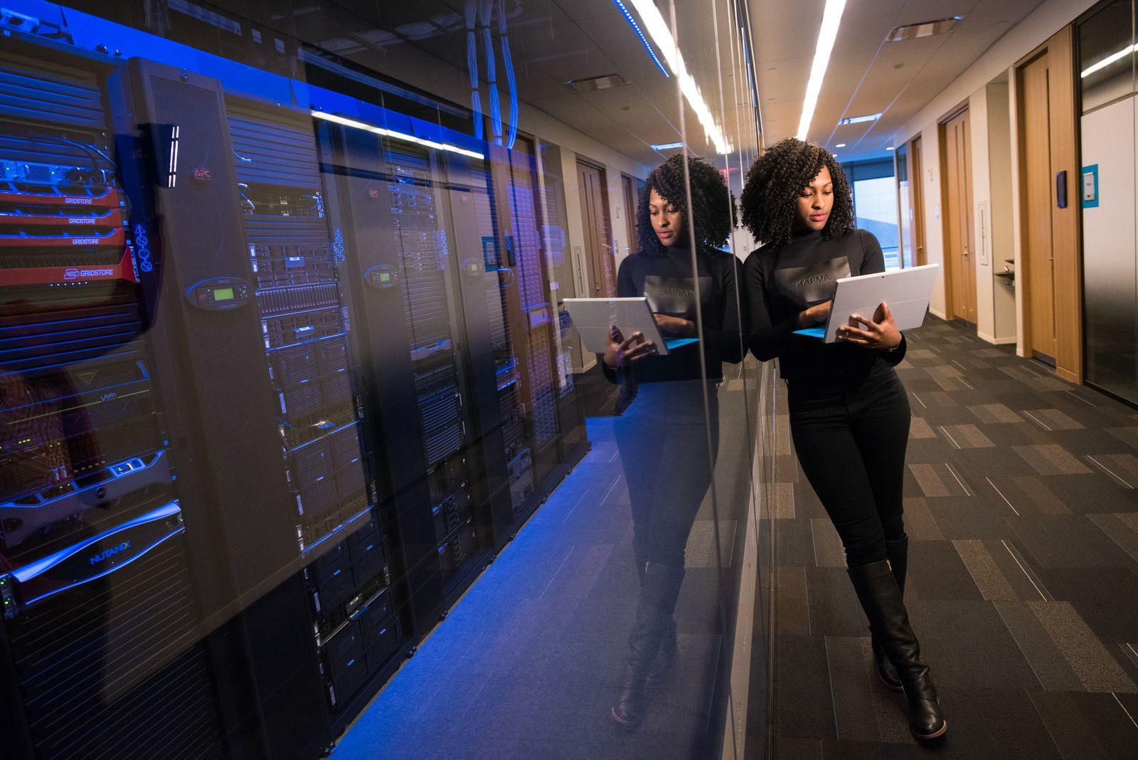 A modern data center with rows of illuminated server racks
