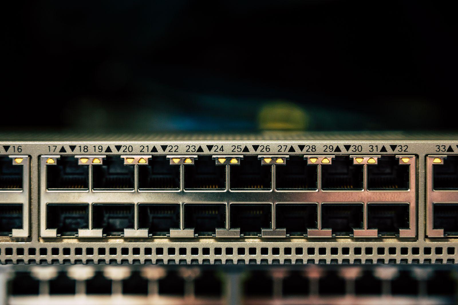 A network switch featuring multiple ethernet ports and LED indicators